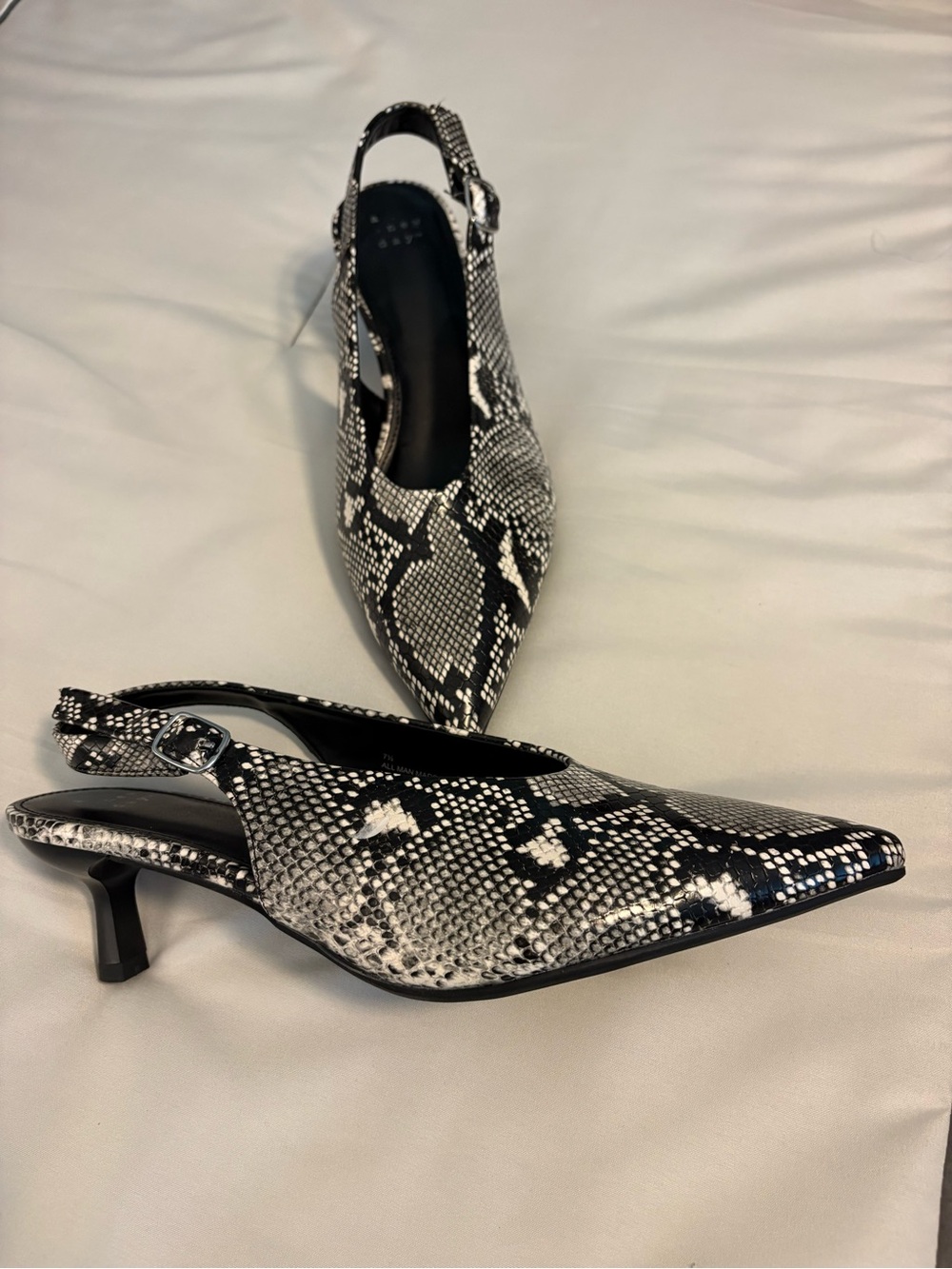 Black & White Snake-Print Pointed Slingback Kitten Heels